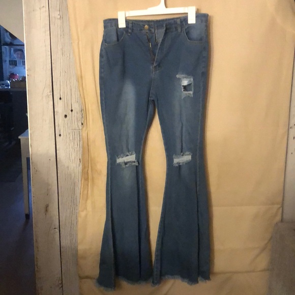 Super flared jeans with rips soft and comfy - Picture 1 of 3